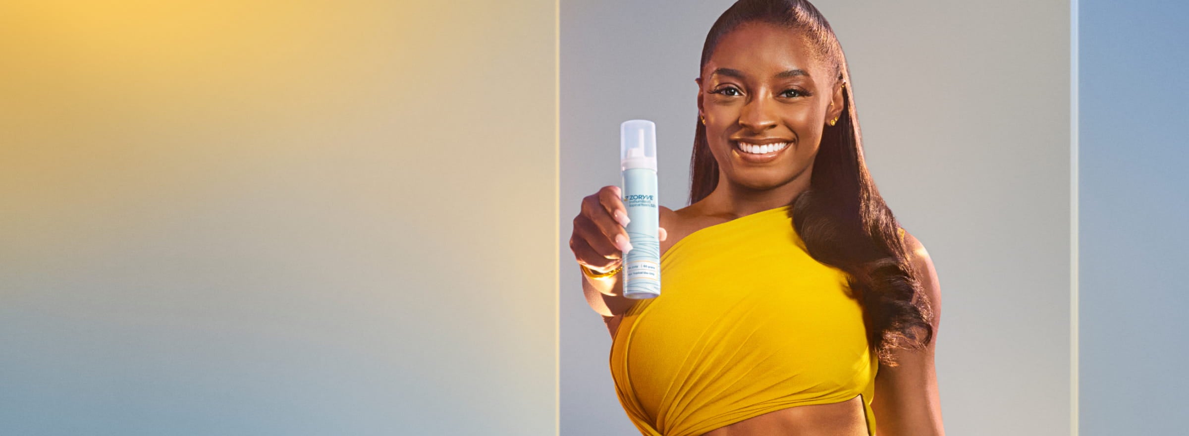 World Champion Gymnast & ZORYVE® (roflumilast) topical foam, 0.3% Patient, Simone Biles, Holding ZORYVE Foam
